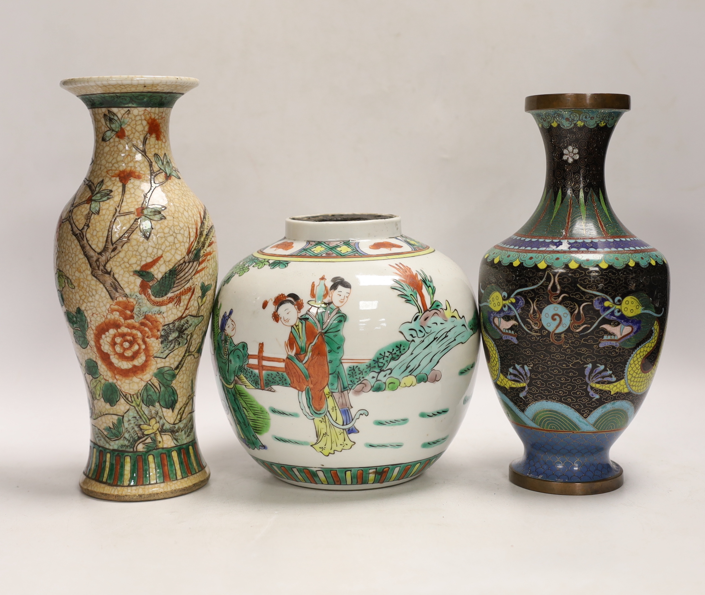A Chinese famille verte crackle glaze vase, a jar, a cloisonné enamel dragon vase, another enamelled jar and cover and a soapstone vase, largest 25cm high
